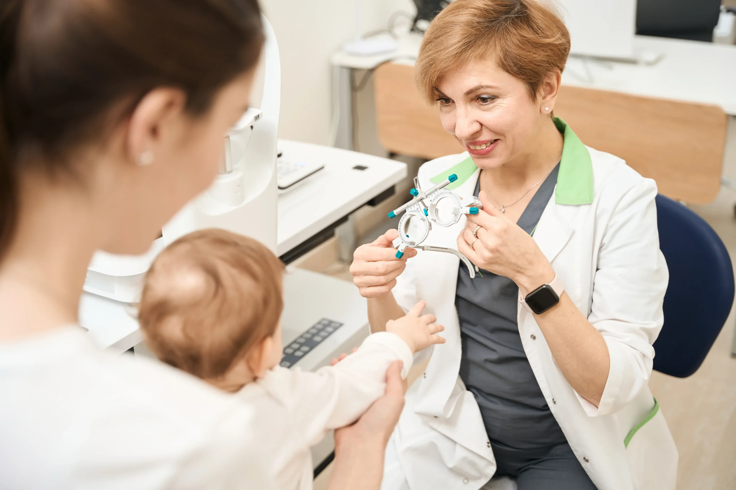 pediatric-ophthalmologist-showing-ophthalmic-devic-2024-10-18-12-14-44-utc